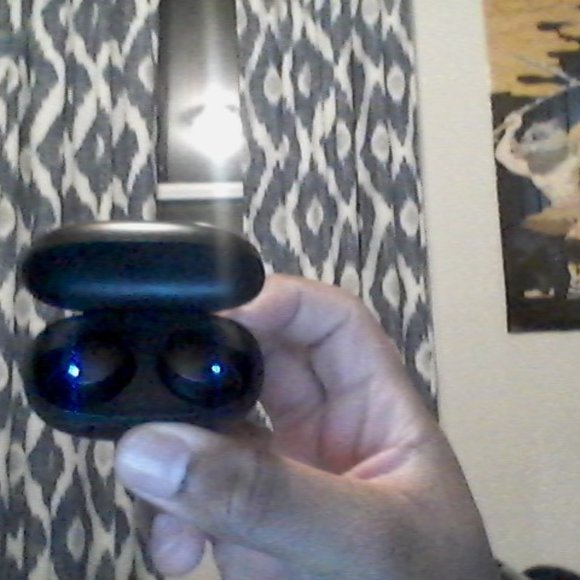 im sellingOnn blue tooth ear buds with charger black case and black earbuds